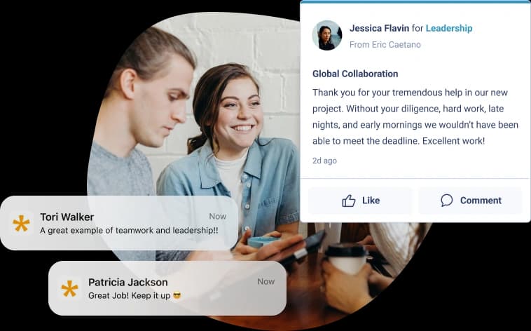 three people looking at a computer