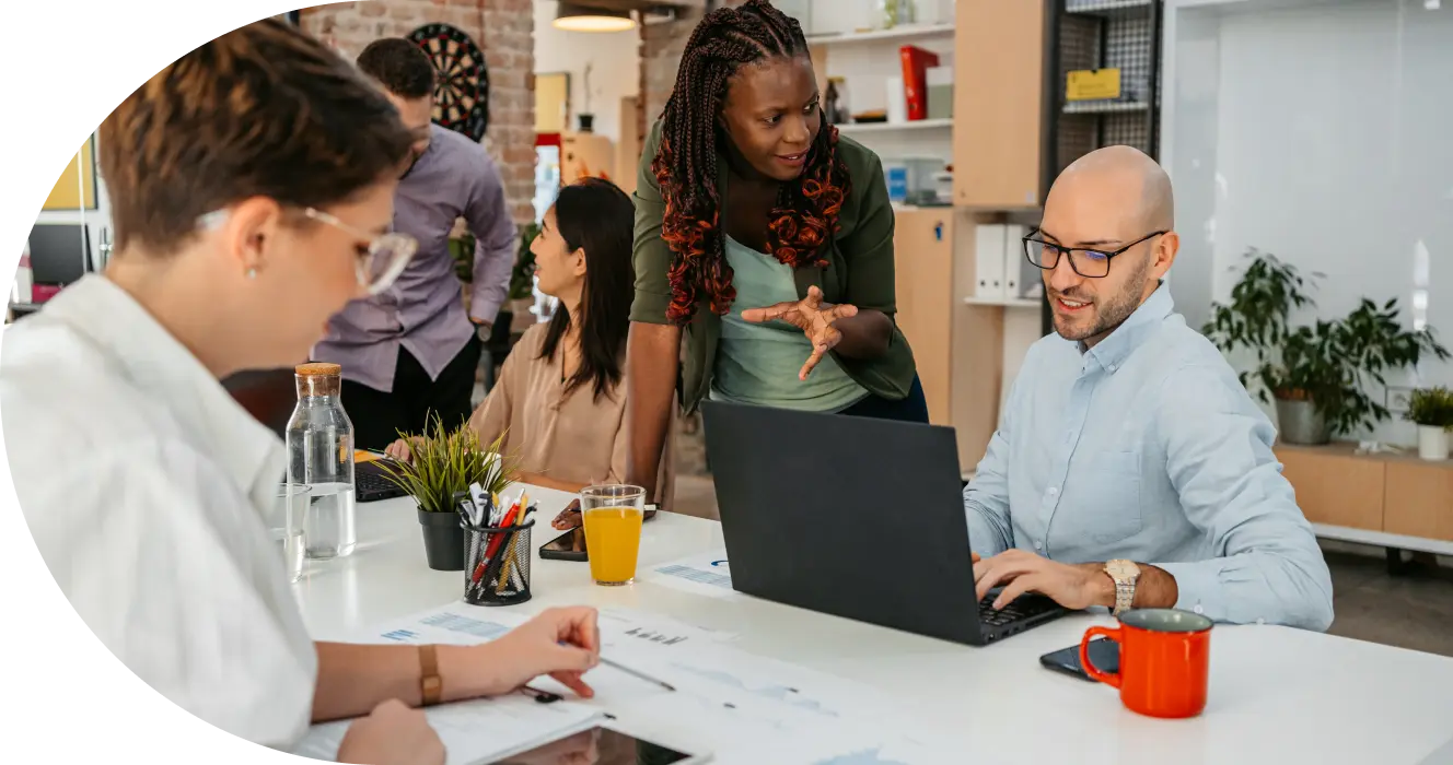 employees working at desk in office