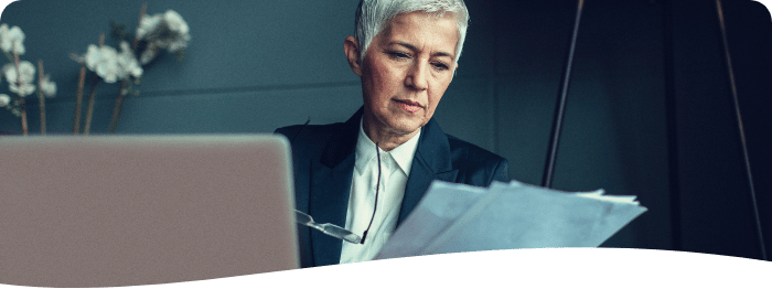 woman reviewing some papers