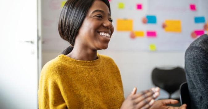 woman looking excited in meeting