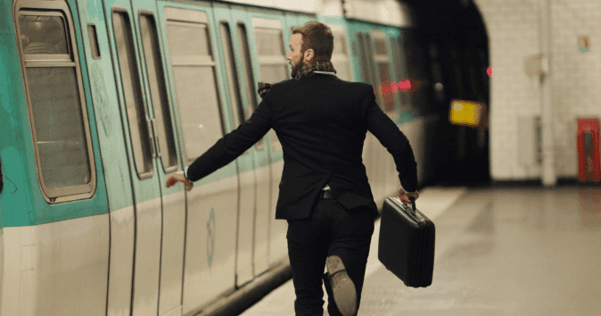 man running for train