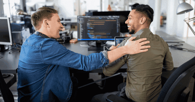 A manager giving positive feedback to an employee